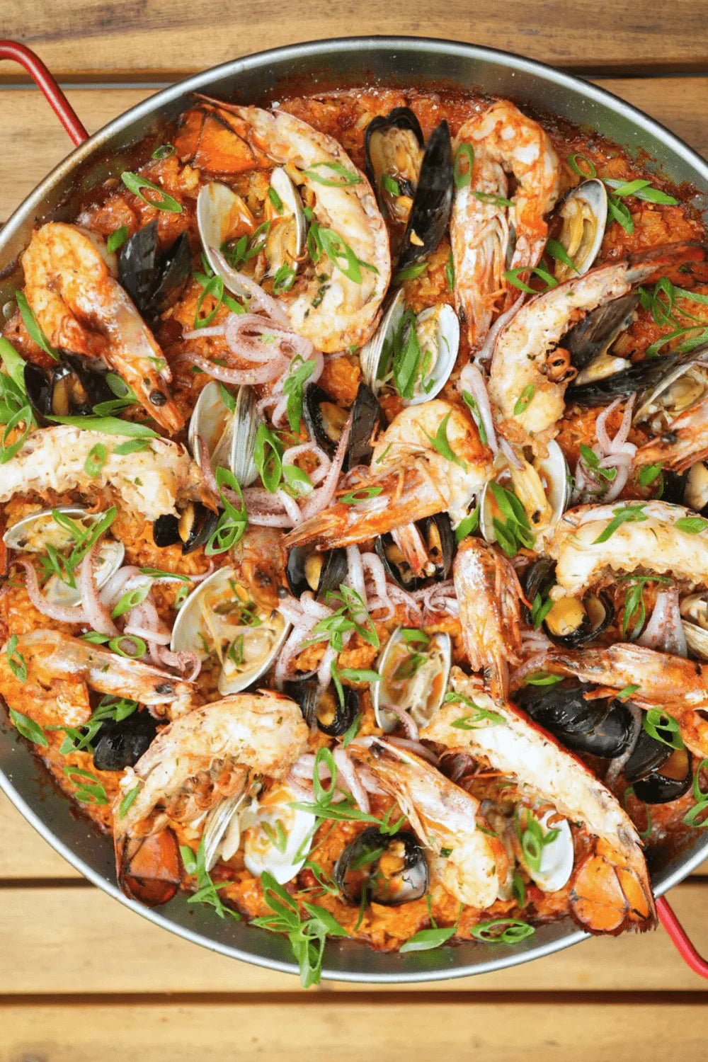 Big Green Egg Seafood Paella Recipe: Easy Grilled Spanish Rice with Shrimp & Mussels - Big Green Egg